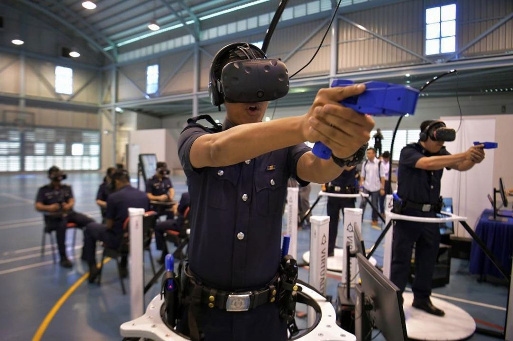 Police officers using virtual reality to train