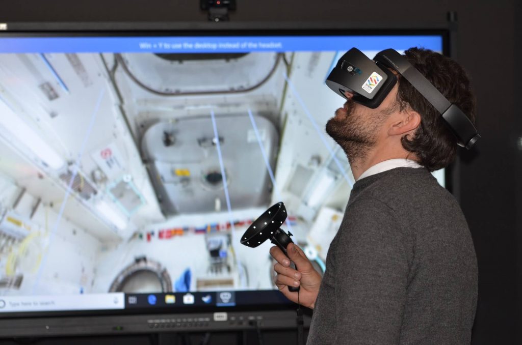 Man using VR headset at work for business operations