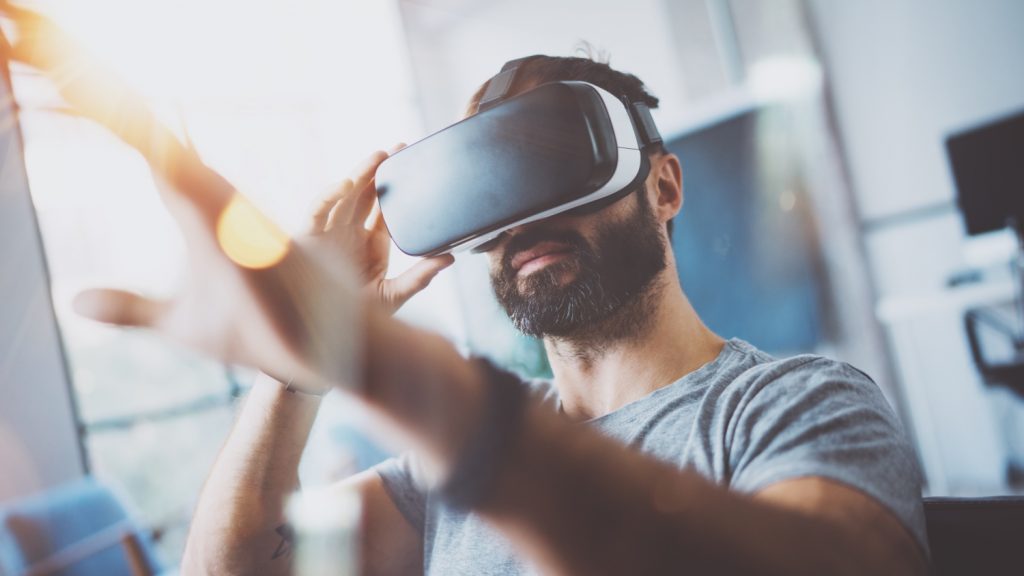 Portrait of a man wearing an Oculus Rift virtual reality 