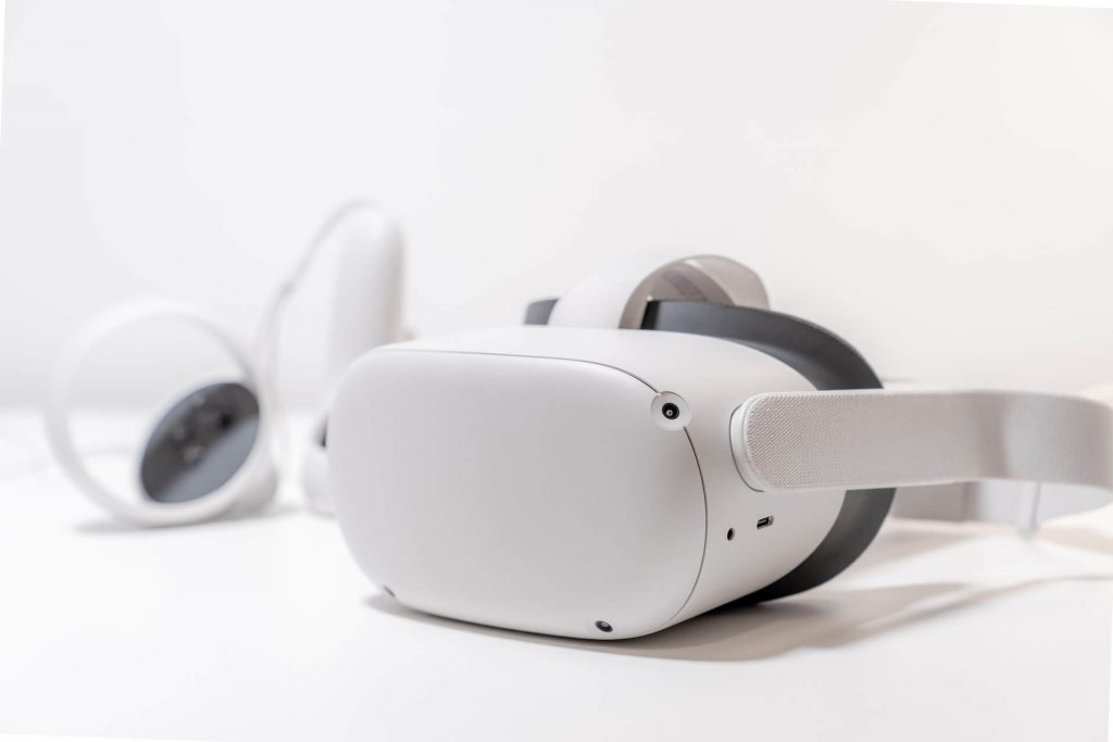 A white virtual reality headset.